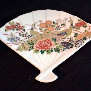 white fan shaped asian style dish